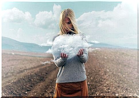 Woman holding a cloud.