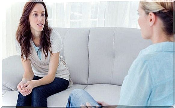 Woman sitting on sofa