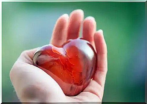 A heart in one hand.