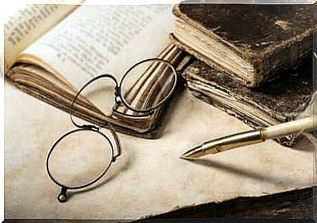 Glasses and old book