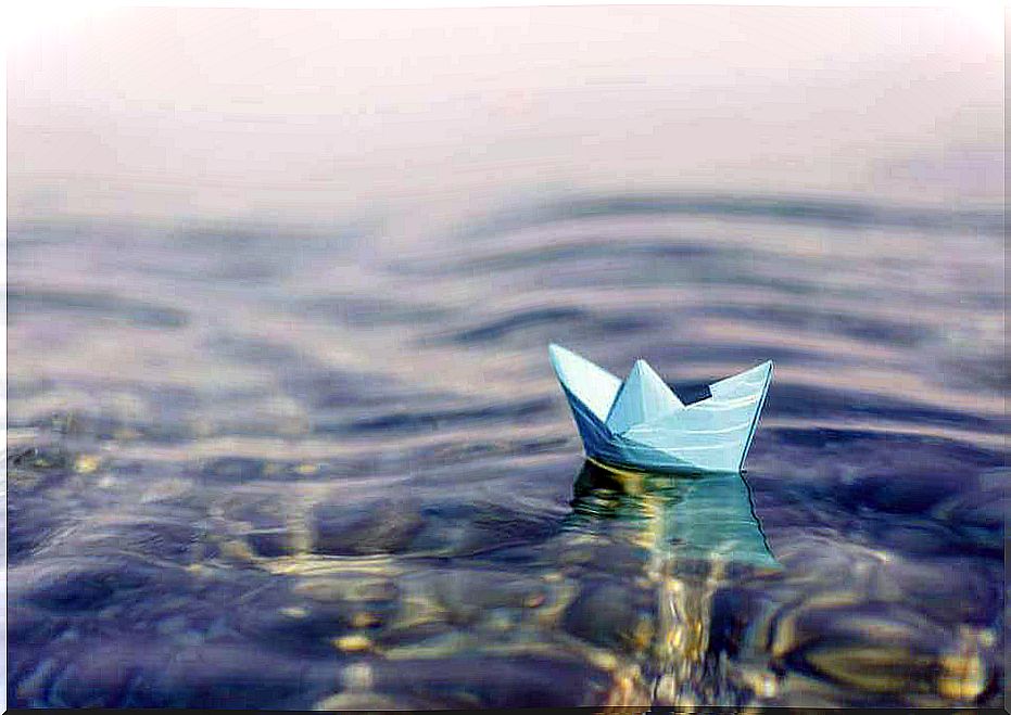 Paper boat in the water.