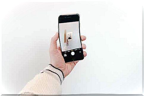 A mobile phone that takes a picture