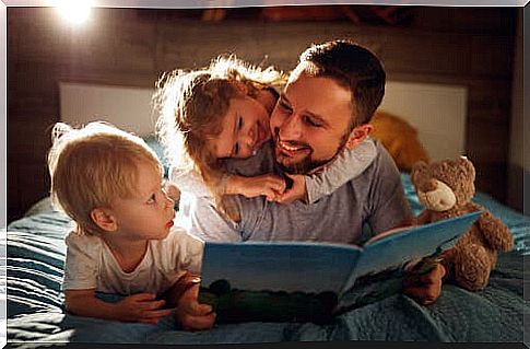 A father who reads with his children to improve their reading comprehension
