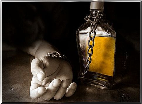 Hand chained to bottle